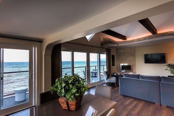 Executive Suite, 2 Bedrooms, Ocean View | Living area | 50-inch Smart TV with cable channels