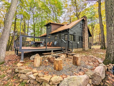 Walk to Lake • Renovated Secluded Forest Escape | The Biddle House by AvantStay