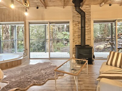 Entire retreat in private rainforest with river. Sleeps20+