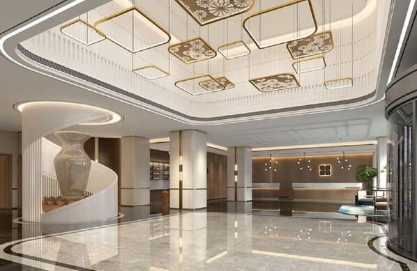 Eine großzügige Lobby mit modernem Design, inklusive einer zentralen Wendeltreppe, einer Rezeption und einer dekorativen Decke mit geometrischen Mustern.