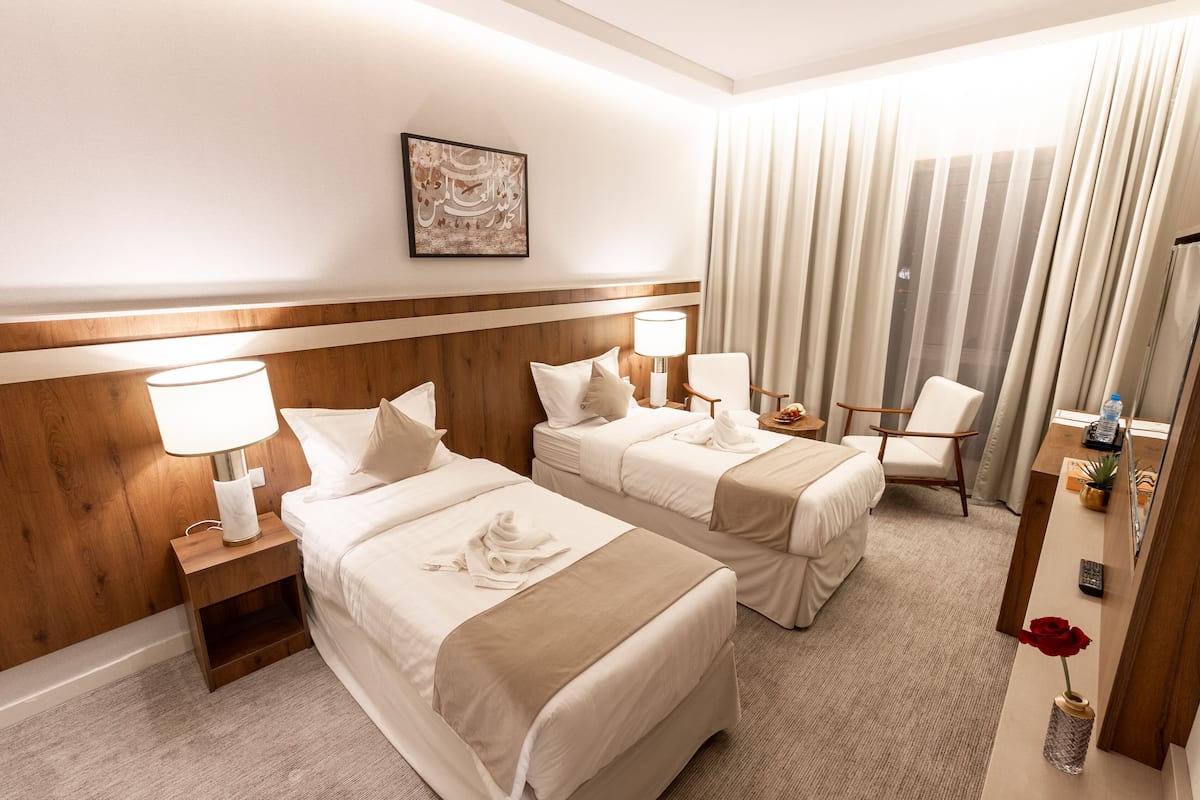 Deluxe Double or Twin Room | 1 bedroom, in-room safe, soundproofing, free cots/infant beds