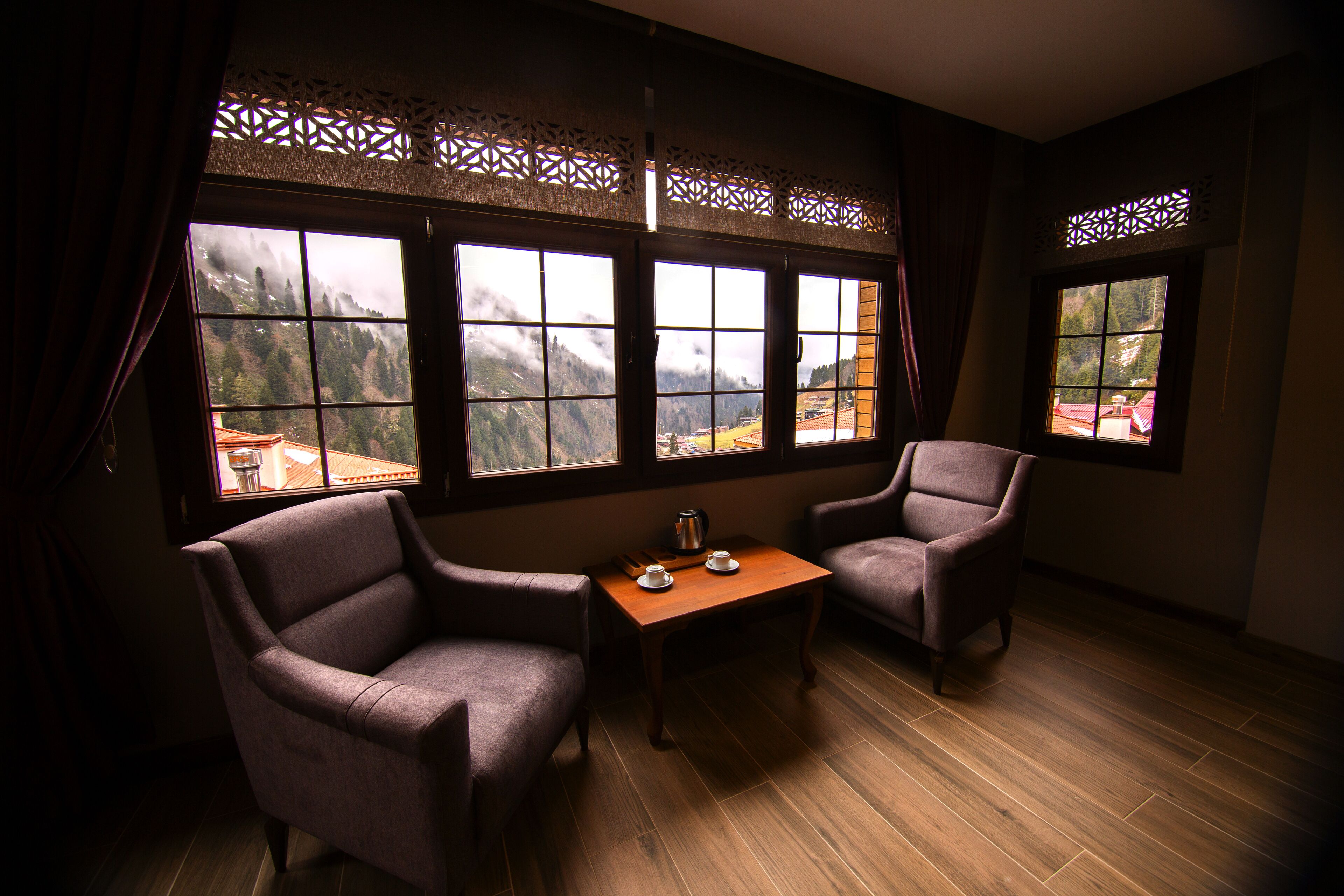 Deluxe Double Room, Mountain View | Living area | 48-inch flat-screen TV with satellite channels, Netflix, heated floors