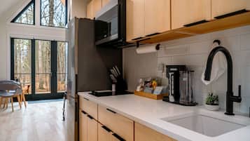 Fridge, microwave, stovetop, coffee/tea maker