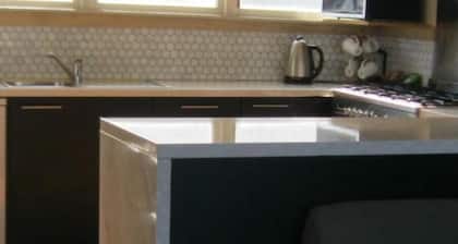 Waterfront 3 -bedroom bungalow opposite the South Bay Marina and public slipway