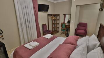 Suíte superior | 1 quarto, lençóis italianos Frette, roupas de cama premium, frigobar