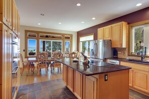 Fridge, microwave, oven, stovetop - Spacious LAKE FRONT home w/100' DOCK & Hot tub on Elk Lake mins to TORCH LAKE (Williamsburg)