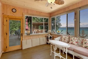 Smart TV, fireplace, books, computer monitors