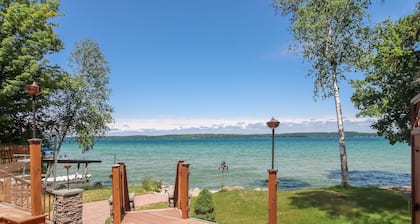 Spacious LAKE FRONT home w/100' DOCK & Hot tub on Elk Lake mins to TORCH LAKE