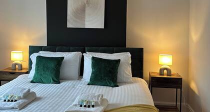 This three bedroom house features zip and link beds, one bathroom and a fully equipped kitchen.