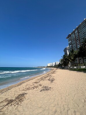 On the beach, sun-loungers, beach towels - Lovely Studio at Condado, Beach Front! (San Juan)