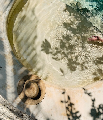 Una piscina al aire libre. Casa Magu Merida