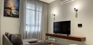 Design Apartment, 2 Bedrooms | Living area | 55-inch Smart TV with cable channels - Kease Ar Rabi I-4 Royal touch  AG34 (Riyadh)