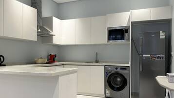 Design Apartment, 2 Bedrooms | Private kitchen | Espresso maker, coffee/tea maker, electric kettle