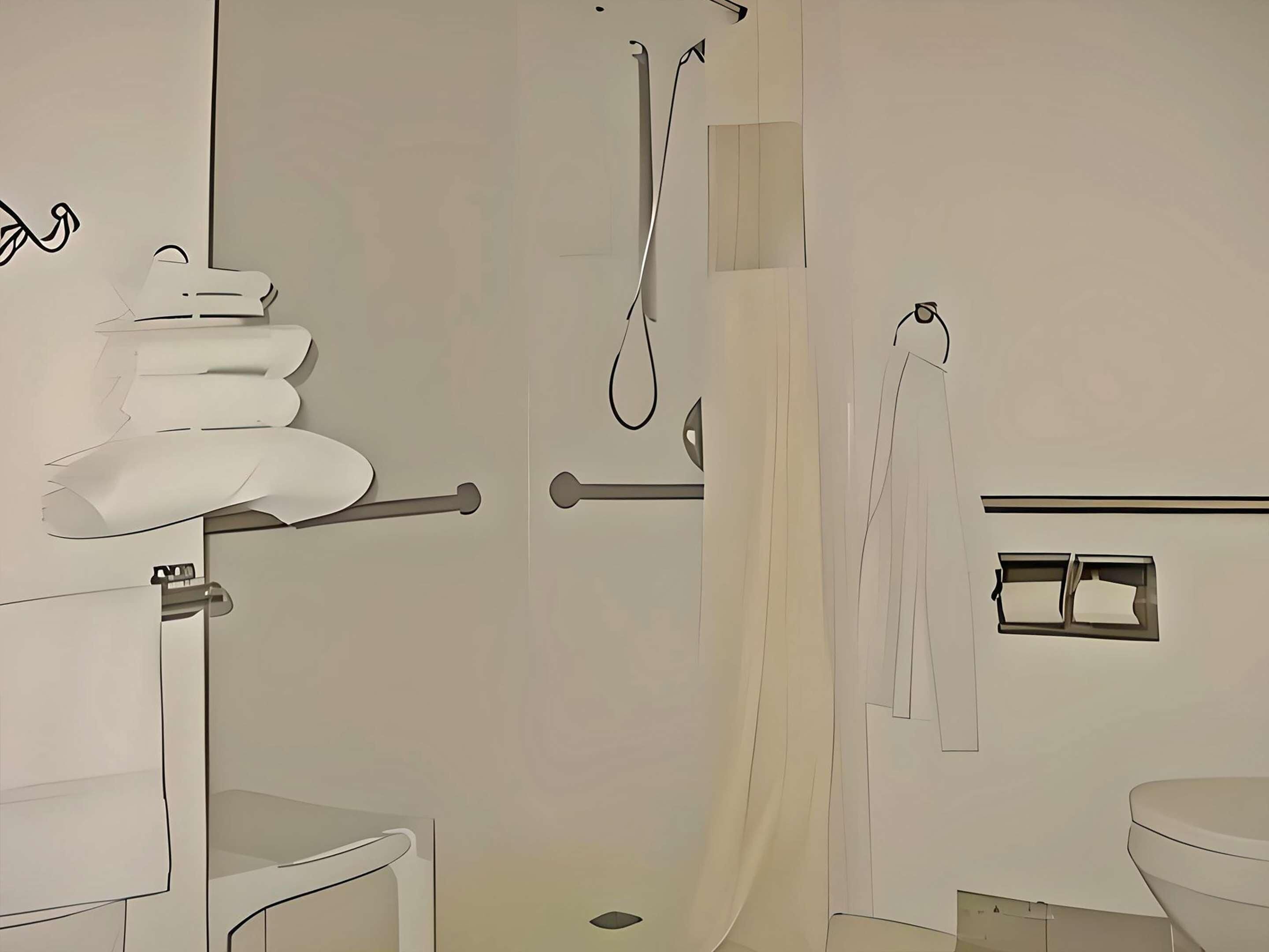 Een badkamer met toilet, douche en wastafel.
