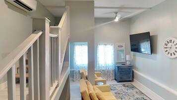 House, Multiple Beds, Pool Access, Pool View (Salty Dunes) | Living area | 50-inch flat-screen TV with digital channels, fireplace