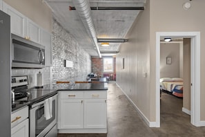 Fridge, microwave, oven, stovetop - The Nelson Lofts - Unit 5 (3 BR) (Davenport)