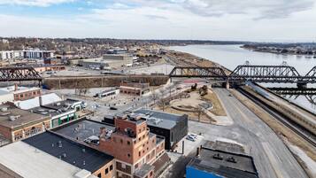 An industrial area with warehouses, a bridge, and a river.