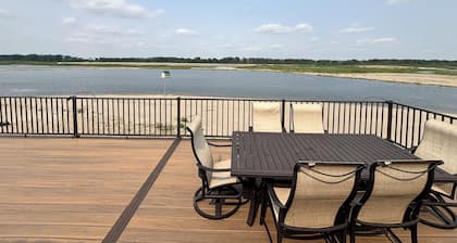 Secluded Elkhorn River Retreat. Full sized home overlooking 250+ acre lake.
