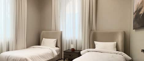 Design Apartment, 2 Bedrooms | 2 bedrooms, blackout curtains, iron/ironing board, free WiFi