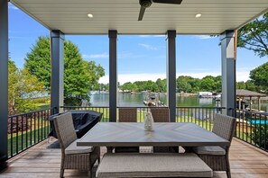 Outdoor dining - Chateau Norman by SoCharm | Luxury Waterfront Home (Cornelius)