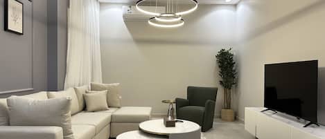 Design Apartment, 2 Bedrooms | Living area | Flat-screen TV