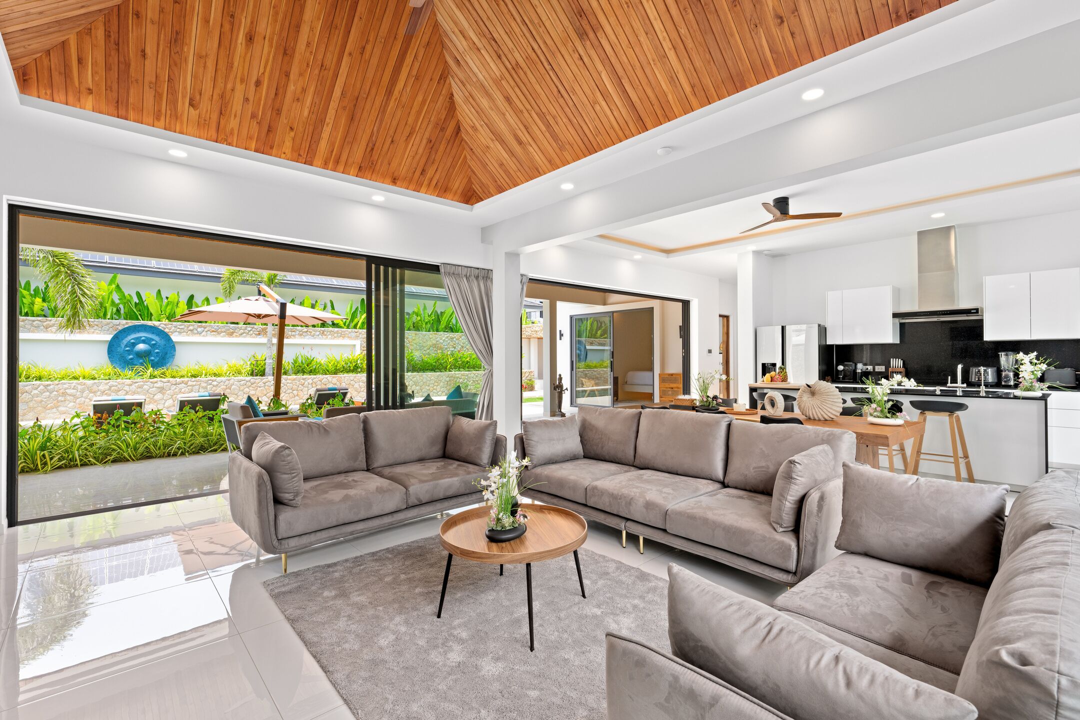 Exclusive Villa | Living area | 65-inch TV with cable channels