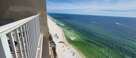 On the beach, sun-loungers, beach towels