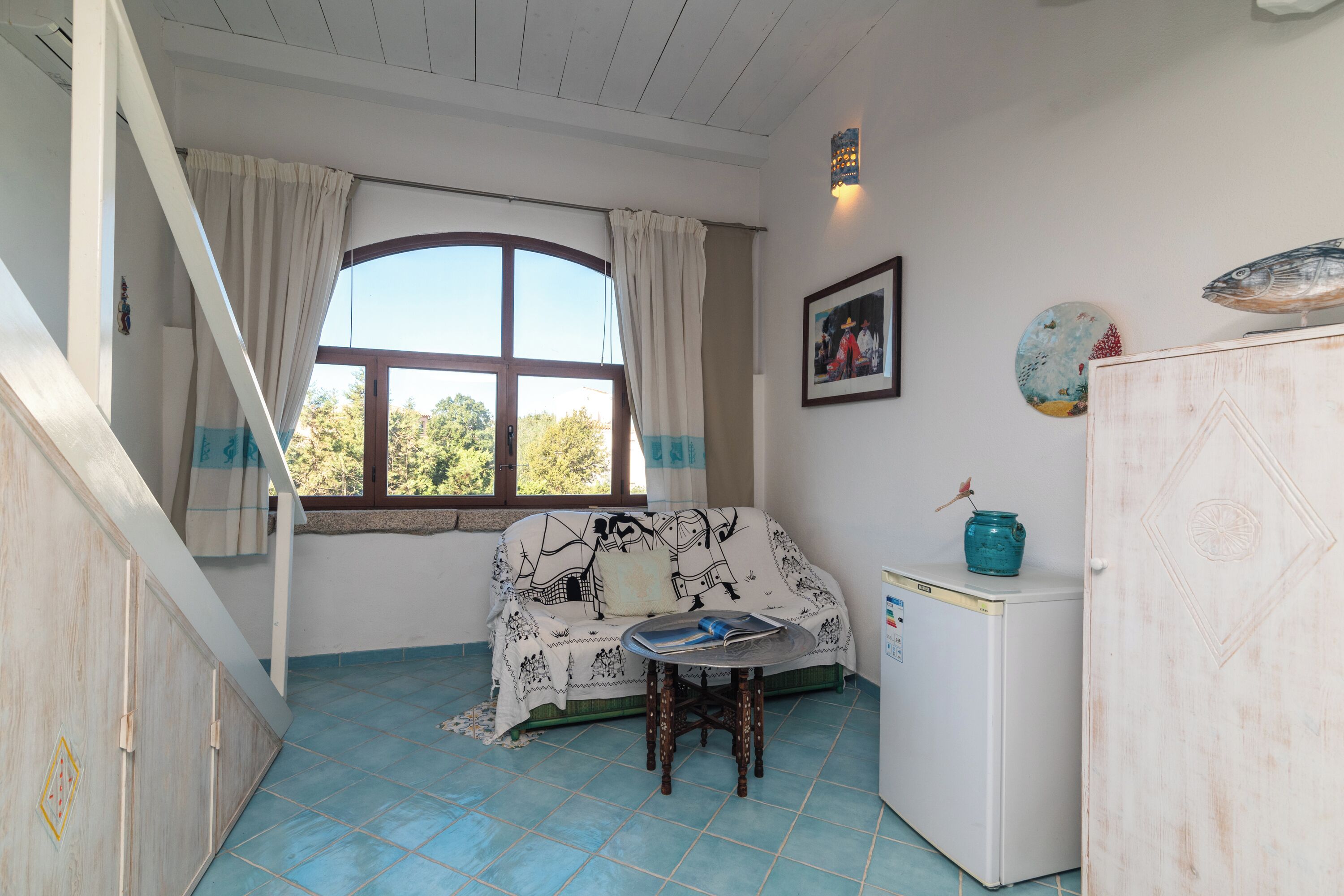 Family Apartment, Multiple Bedrooms (Bilo Porto Rotondo Castello 3) | Living area | 21-inch flat-screen TV with cable channels