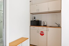 Fridge, microwave, coffee/tea maker, toaster