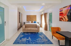 Chambre Deluxe | 1 chambre, chambres insonorisées, fer et planche à repasser