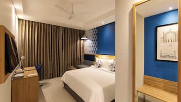 Desk, blackout curtains, soundproofing, iron/ironing board