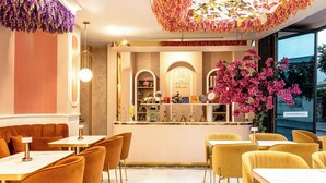A restaurant interior with a bar area, seating arrangements, and a decorative ceiling. - Golden Horn Bosphorus Hotel  (Istanbul)
