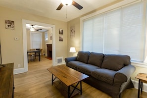 TV, fireplace, offices - Rolston House - 1 Bed House near Xavier & Downtown (Norwood)