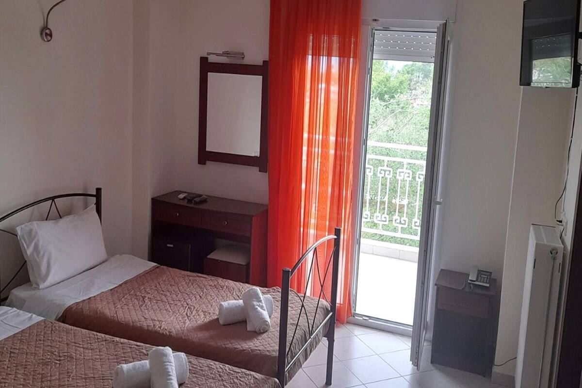Standard Triple Room, Courtyard View | In-room safe, iron/ironing board (on request), WiFi (free)