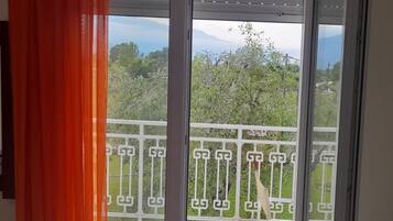 Standard Triple Room, Courtyard View | In-room safe, iron/ironing board, free WiFi