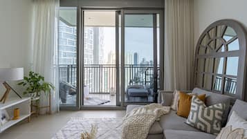 Design Apartment | Living area | 50-inch Smart TV with cable channels