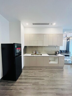 Deluxe Apartment | Private kitchen | Full-size fridge, microwave, stovetop, rice cooker - NVT Housing - Vinhomes Ocean Park Apartment Hanoi (Hanoi)