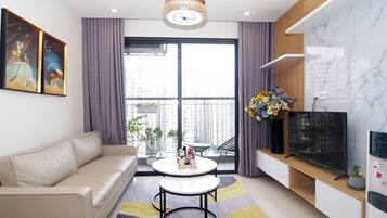 Family Apartment | Living room | 50-inch Smart TV with digital channels