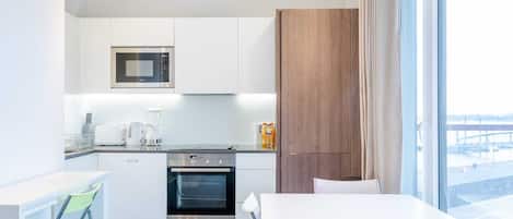 Apartment | Eigene Küche | Kühlschrank, Mikrowelle, Ofen, Herdplatte