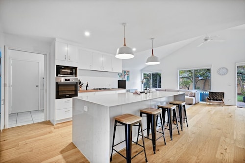 Salt Air Hideaway with Lush Backyard