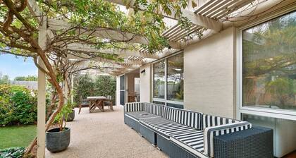 Salt Air Hideaway with Lush Backyard