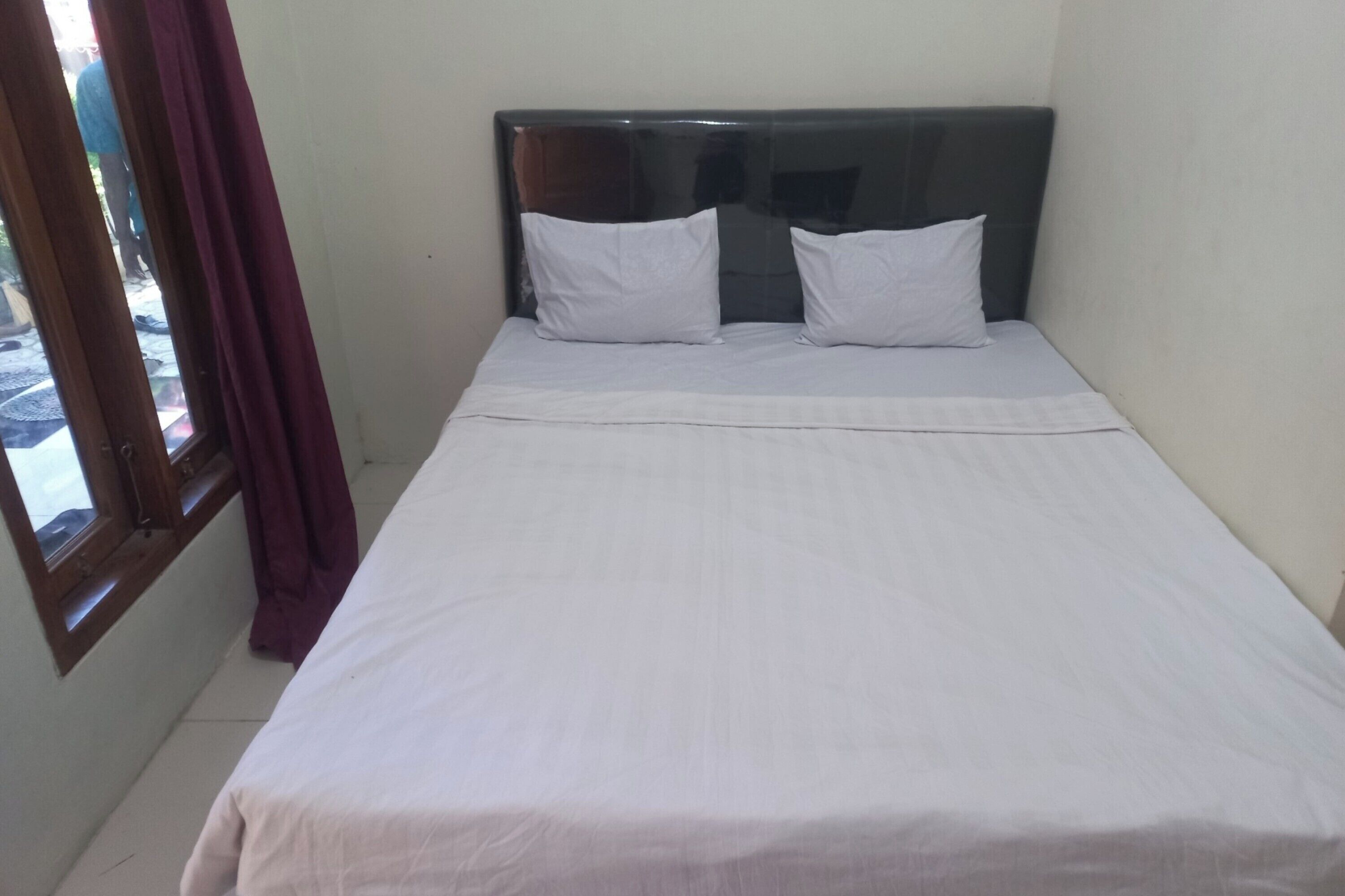 Foto - Hotel O Chimi Rumah Kost