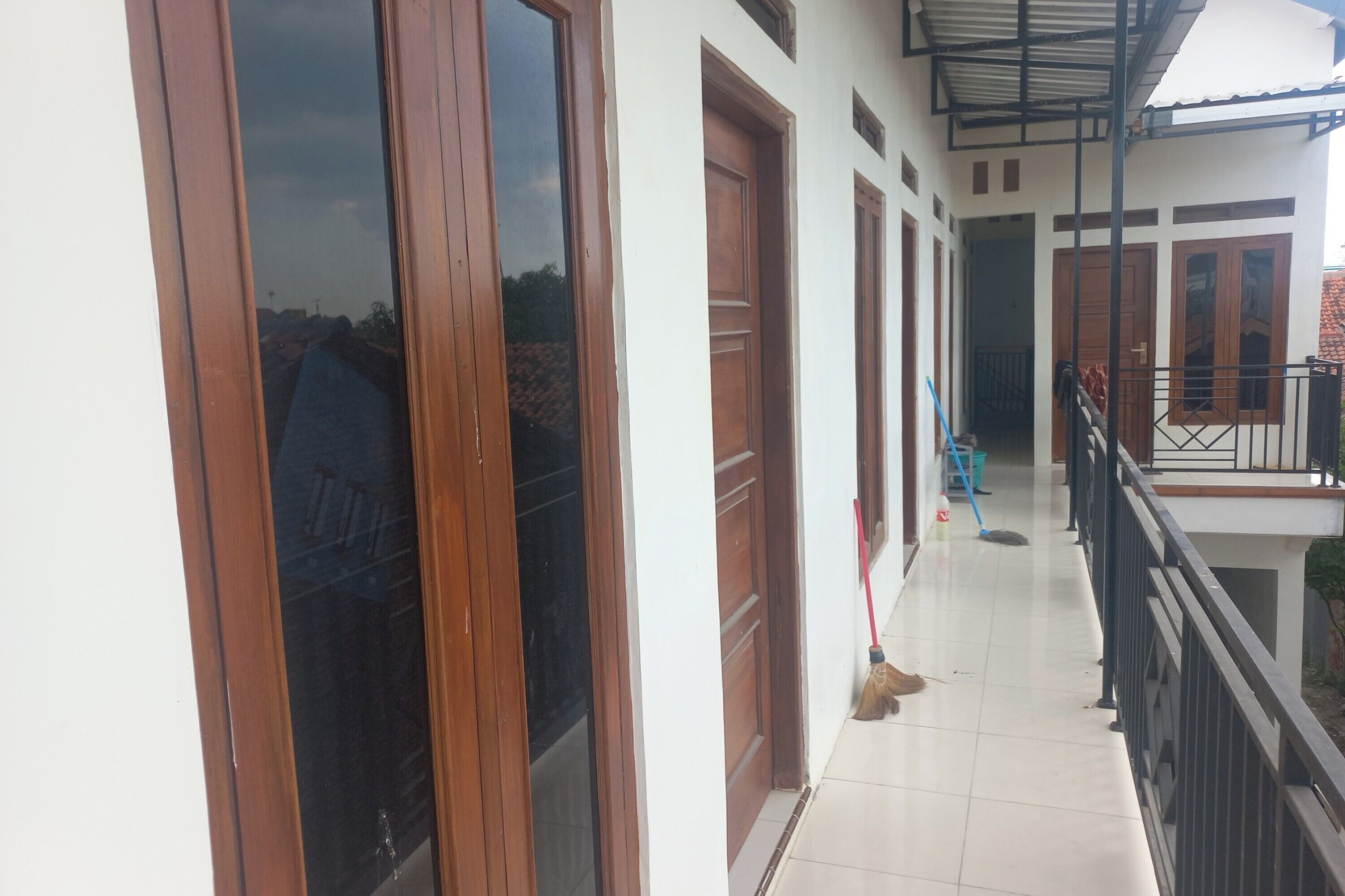 Foto - Hotel O Chimi Rumah Kost