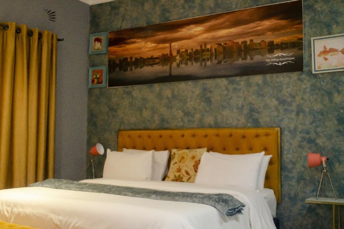 Suite Deluxe | 1 habitación, ropa de cama de alta calidad, edredón y minibar 