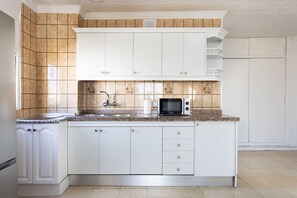 Fridge, microwave, coffee/tea maker, electric kettle