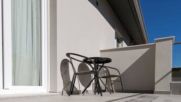 Superior Double Room, City View | Terrace/patio