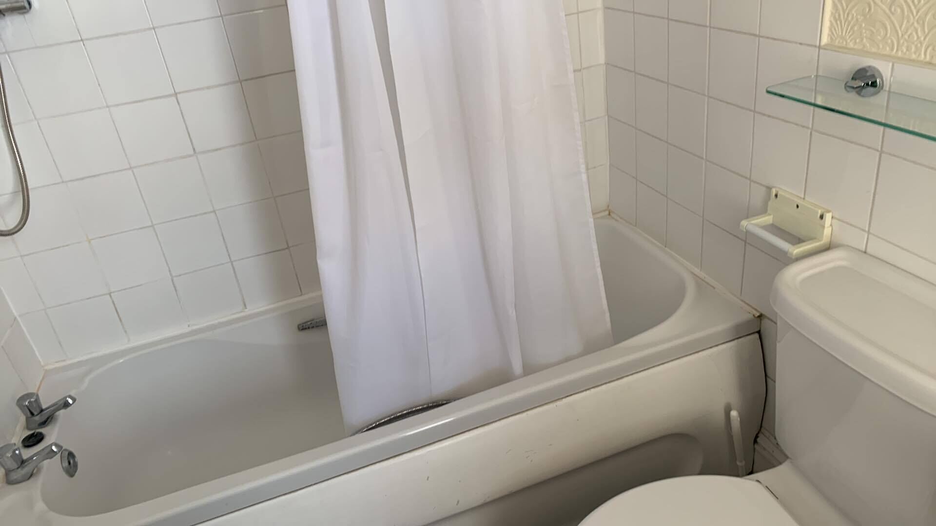 Shower, rainfall showerhead, hair dryer, towels