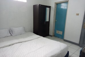 Deluxe Double Room | Bed sheets - Hotel O Blio Guest House Syariah (Bandung)