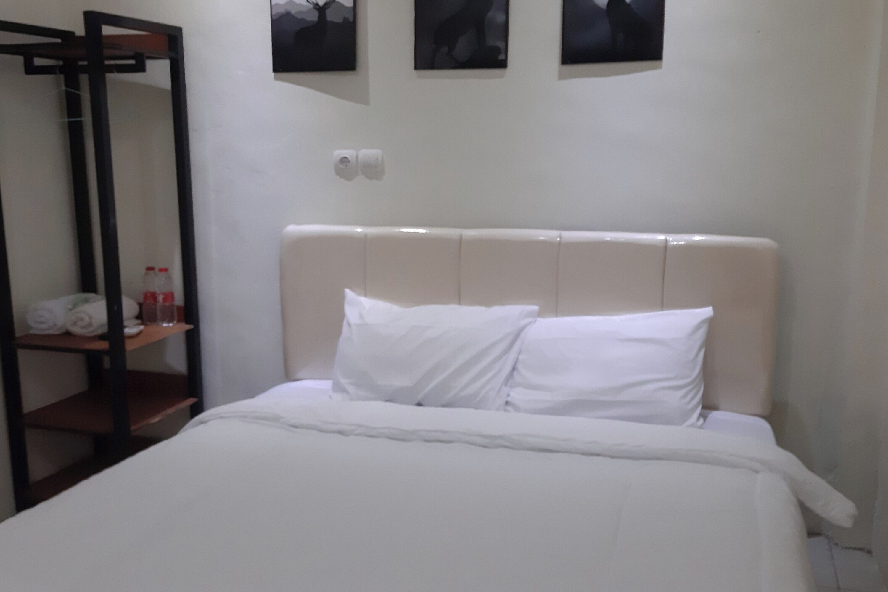 Kamar Double Standar | Wi-Fi gratis dan seprai linen