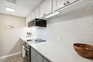 Fridge, microwave, coffee/tea maker, toaster